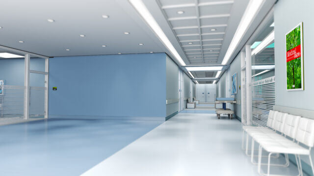 3D rendering of a hospital interior. Bright lights and clean white and blue walls and flooring