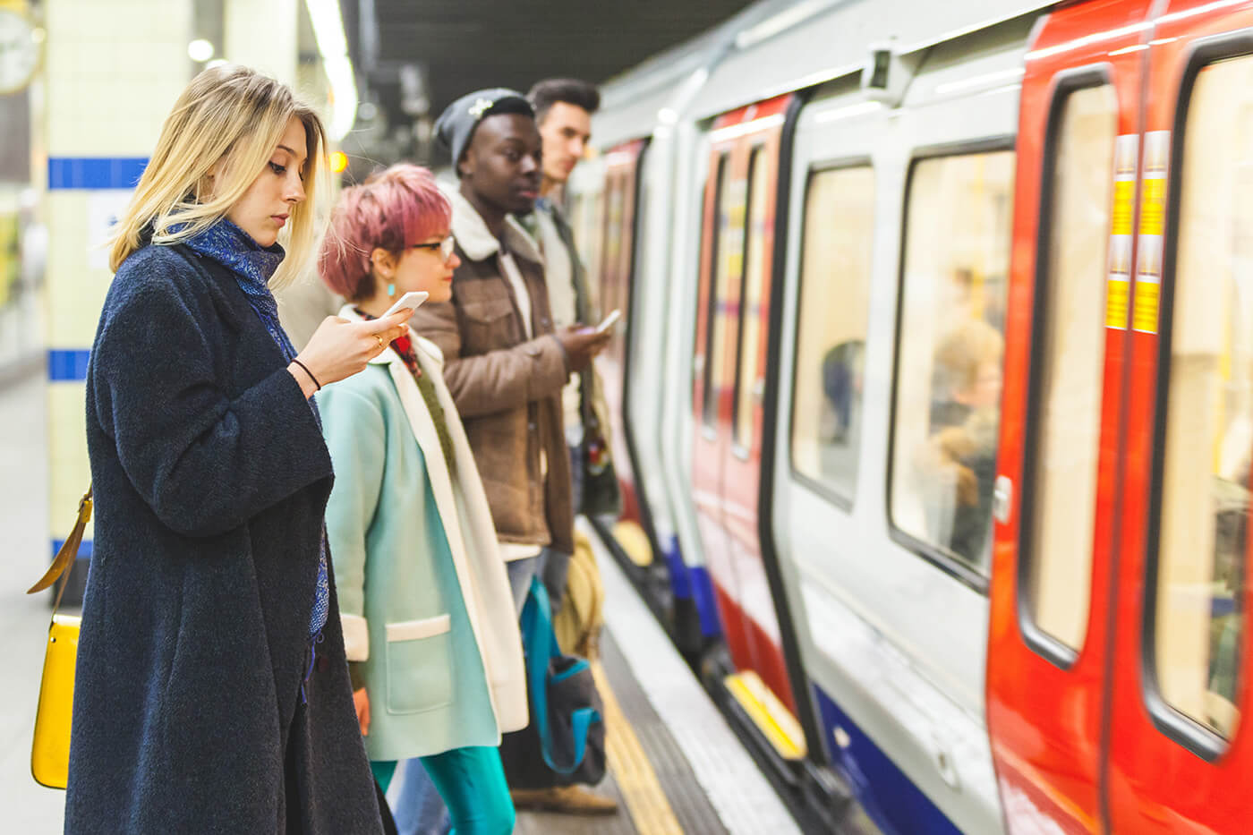 people waiting for subway on the platform