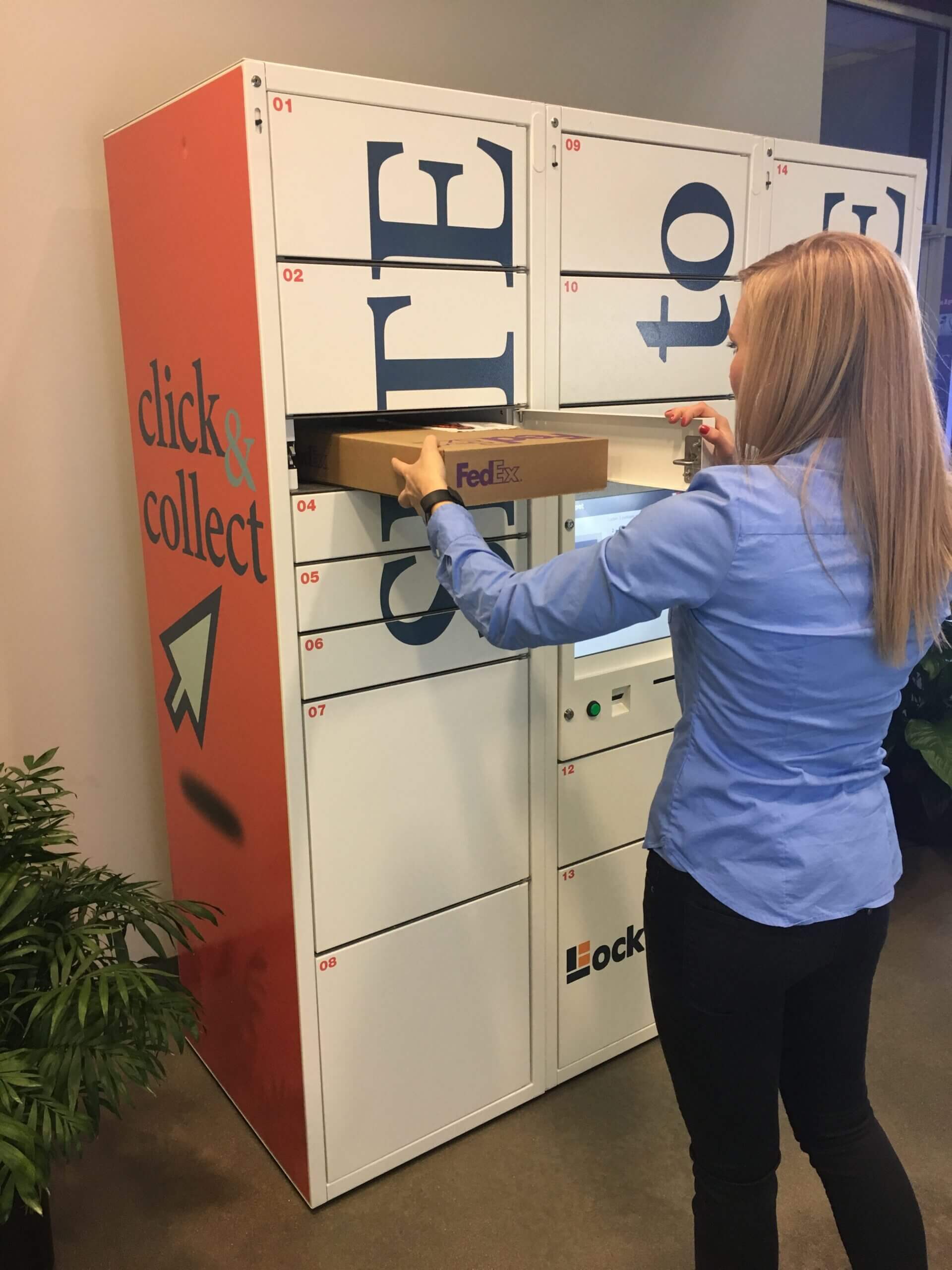 woman inserting fedex package into lockspot kiosk