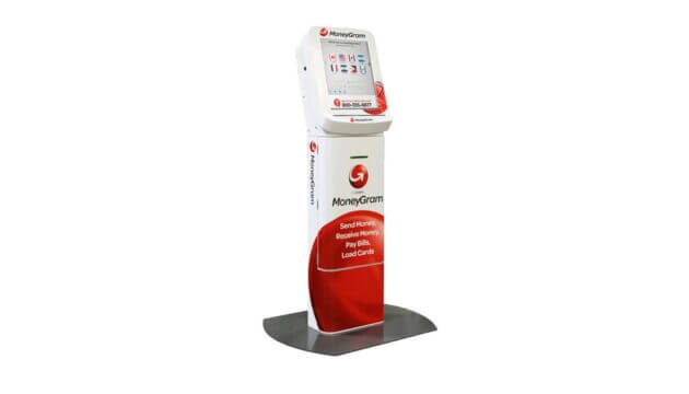 A Moneygram kiosk; it is tall, thin and red and white with a large screen at the top