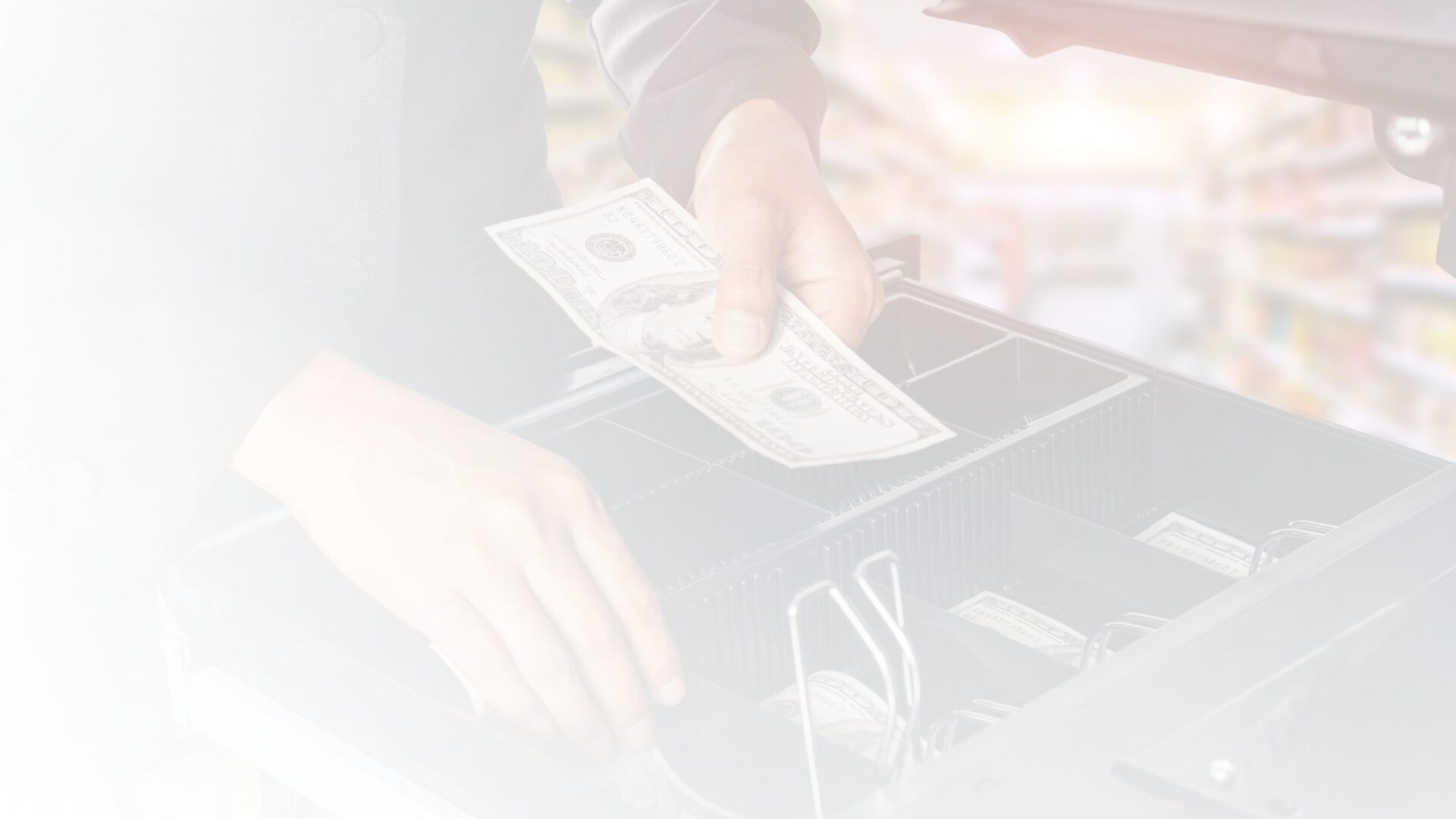 Cash payment kiosk processing a retail transaction with cash drawer open